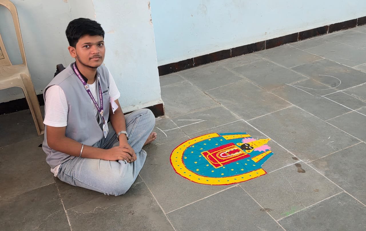 XII Commerce Mayuresh Suryawanshi got 1st Prize in Rangoli Competition. I have taken Prize on his behalf as he has participated in Poster Making also.